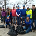 Republic Services volunteers cleaning up Narrows Beach on Earth Day